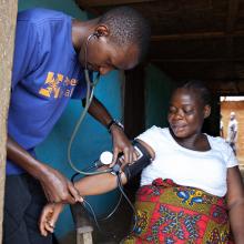 A health worker attends to a pregnant woman